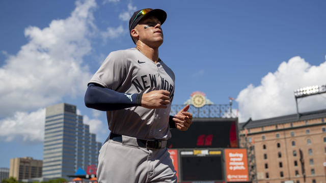 Aaron Judge #99 of the New York Yankees celebrates with Juan Soto #22 after hitting a home run in the fifth inning against the Baltimore Orioles at Oriole Park at Camden Yards on July 13, 2024 in Baltimore, Maryland. 