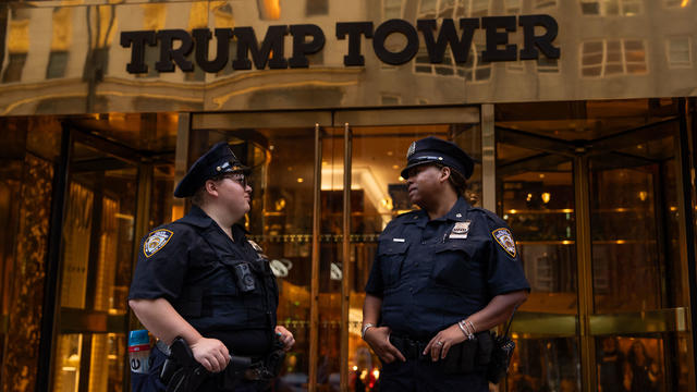 Marquee and clock at the main entrance to the Trump Tower 