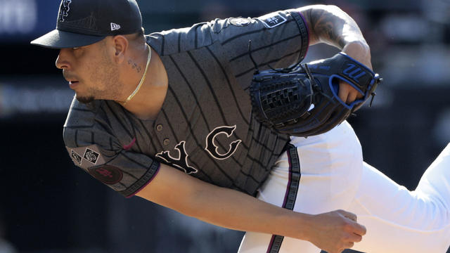 José Buttó #70 of the New York Mets follows through after throwing a pitch in relief during the game against he Colorado Rockies at Citi Field on July 13, 2024 in New York City. 